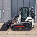 Hydromek crawler backhoe loader